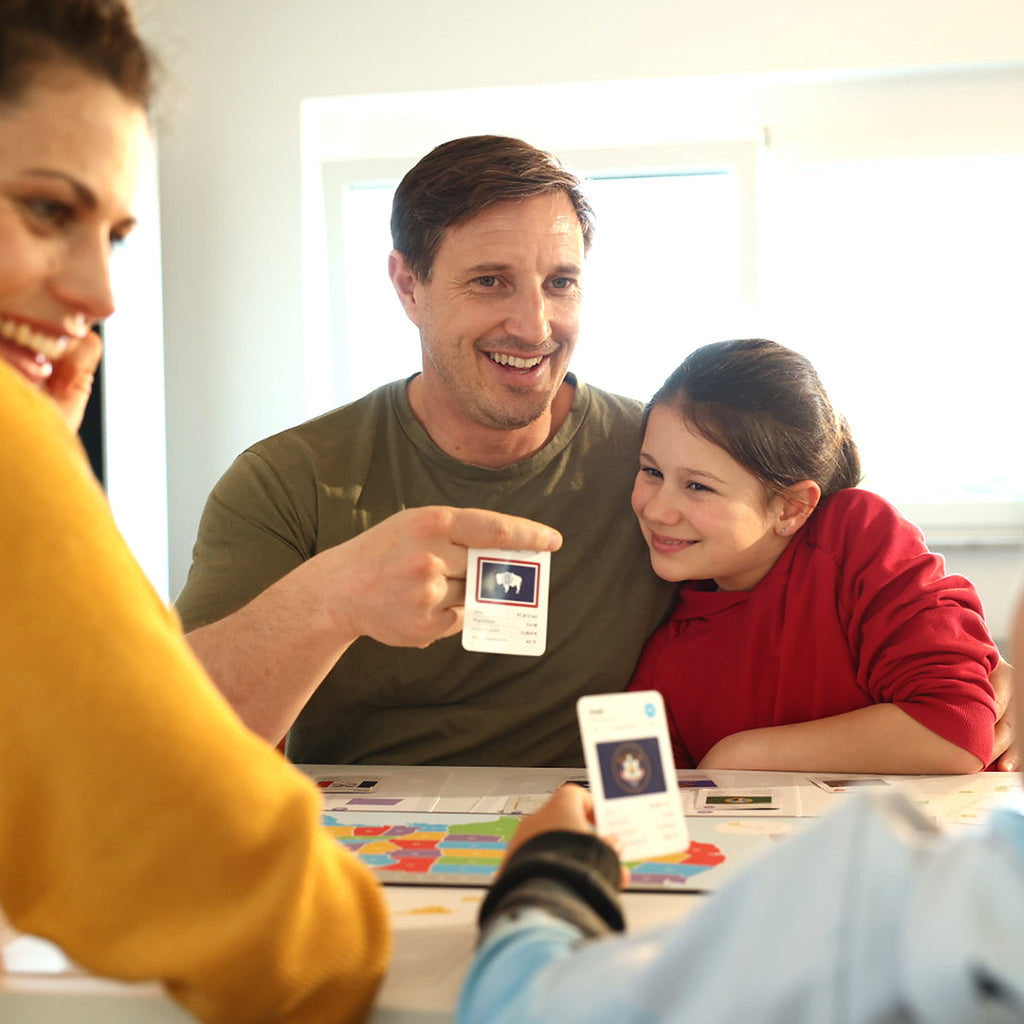 Family playing games / One of the best games of the 50 states games you can buy for your kids